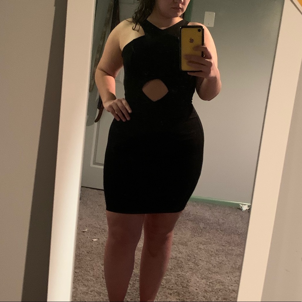 Black dress with mid cut out and open back